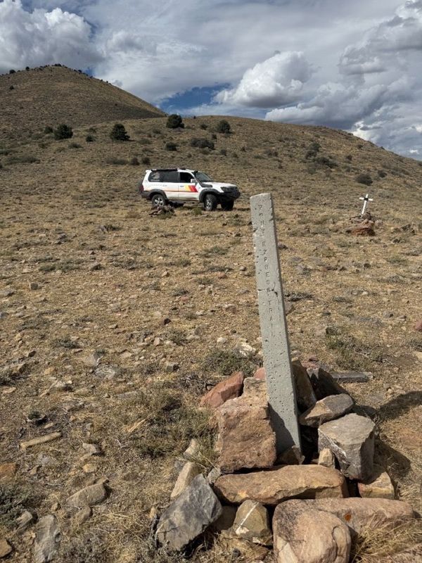 Pony Express Trail concrete post with overland rig