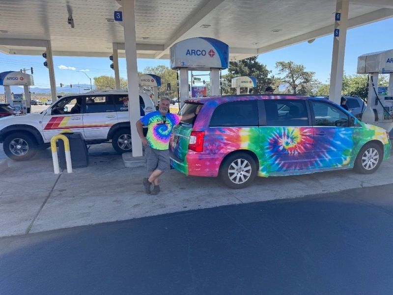 Tie-dye van at fuel stop