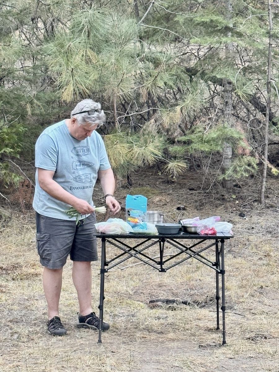 Vadim in action prepping salad at camp